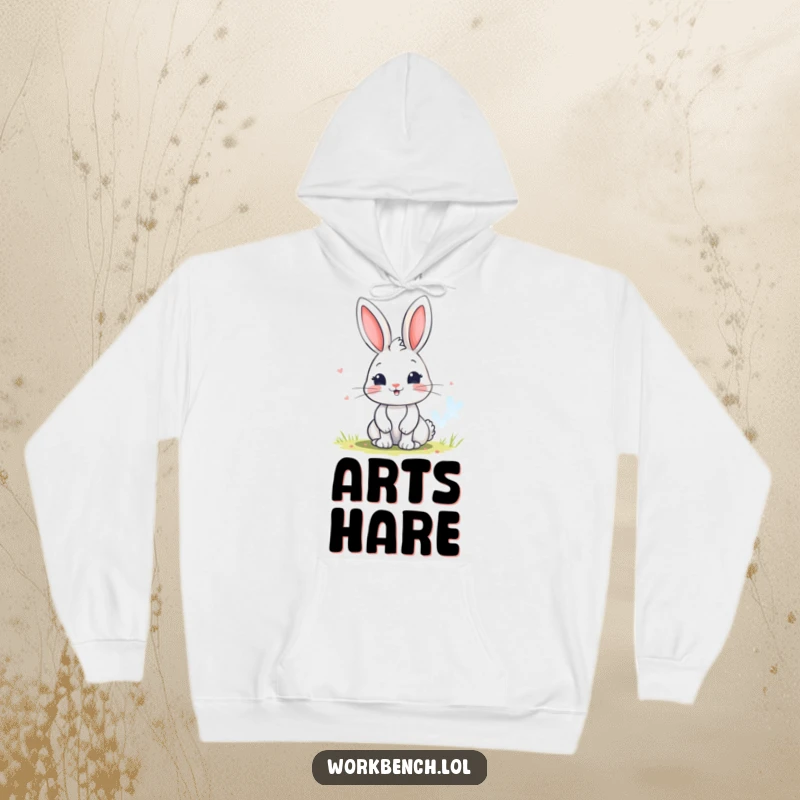 Funny bunny hoodie featuring a playful character painting a vibrant, colorful picture, offering warmth and artistic charm.